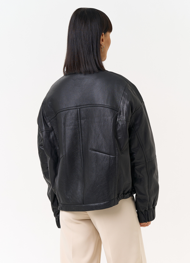 фото Женский пуховик из натуральной кожи черного цвета модель № 31691