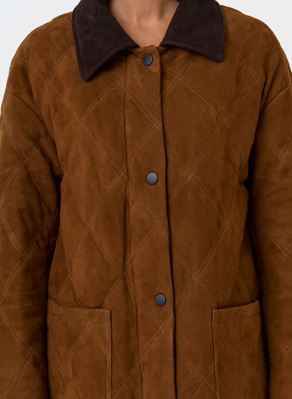 Женский пуховик из натуральной замши 